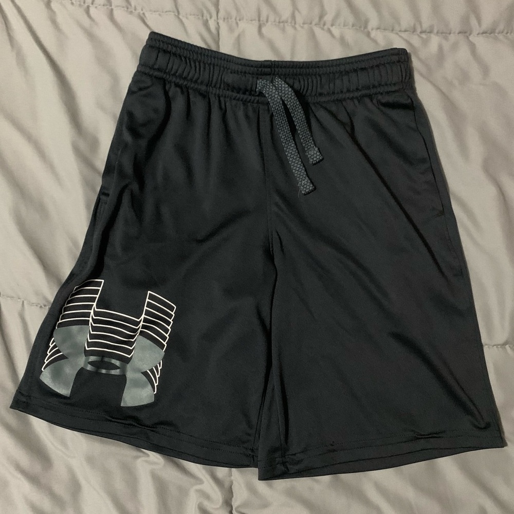 Black, white, and gray under armour shorts. Small